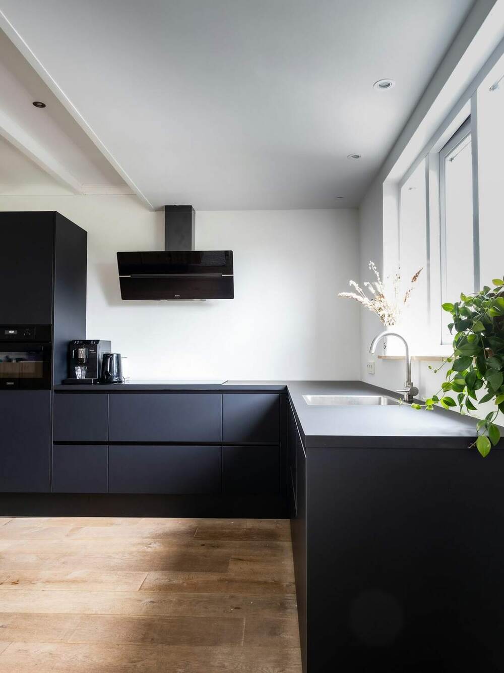 Matte black kitchen, East Austin